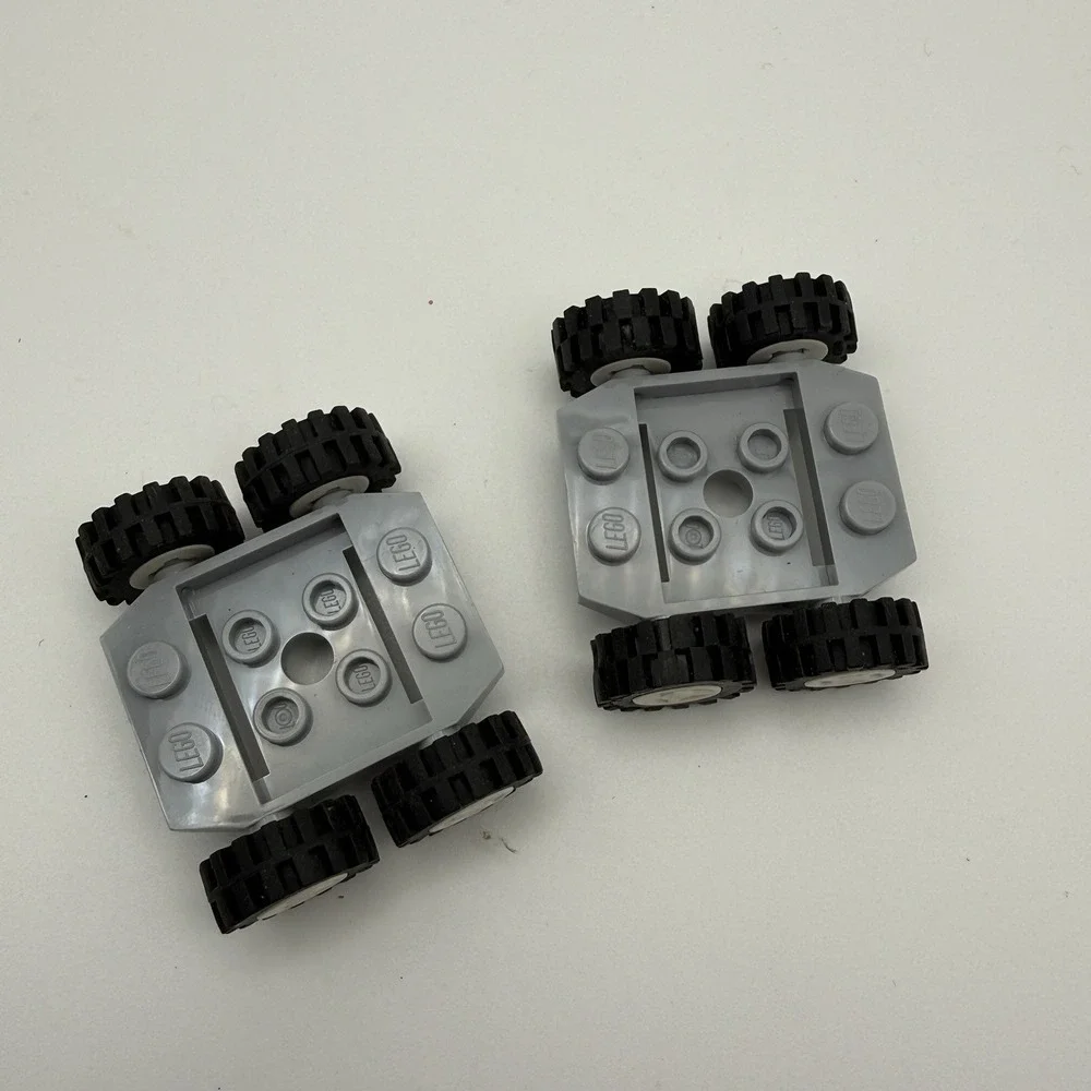 2 LEGO Light Bluish Gray Vehicle Base 3x4x2/3 Wheels Black & White Rims 24326 - Picture 2 of 4